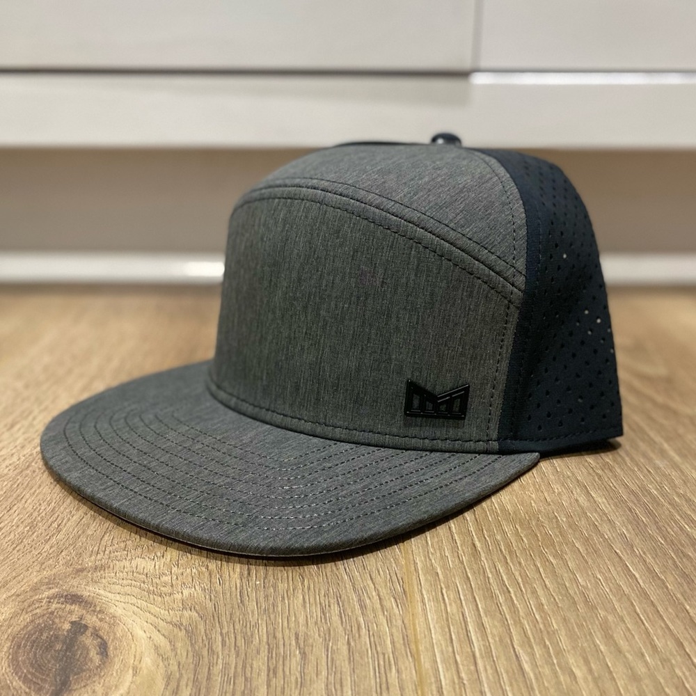 Brand New with tags Melin Hydro Trenches hat. Classic size